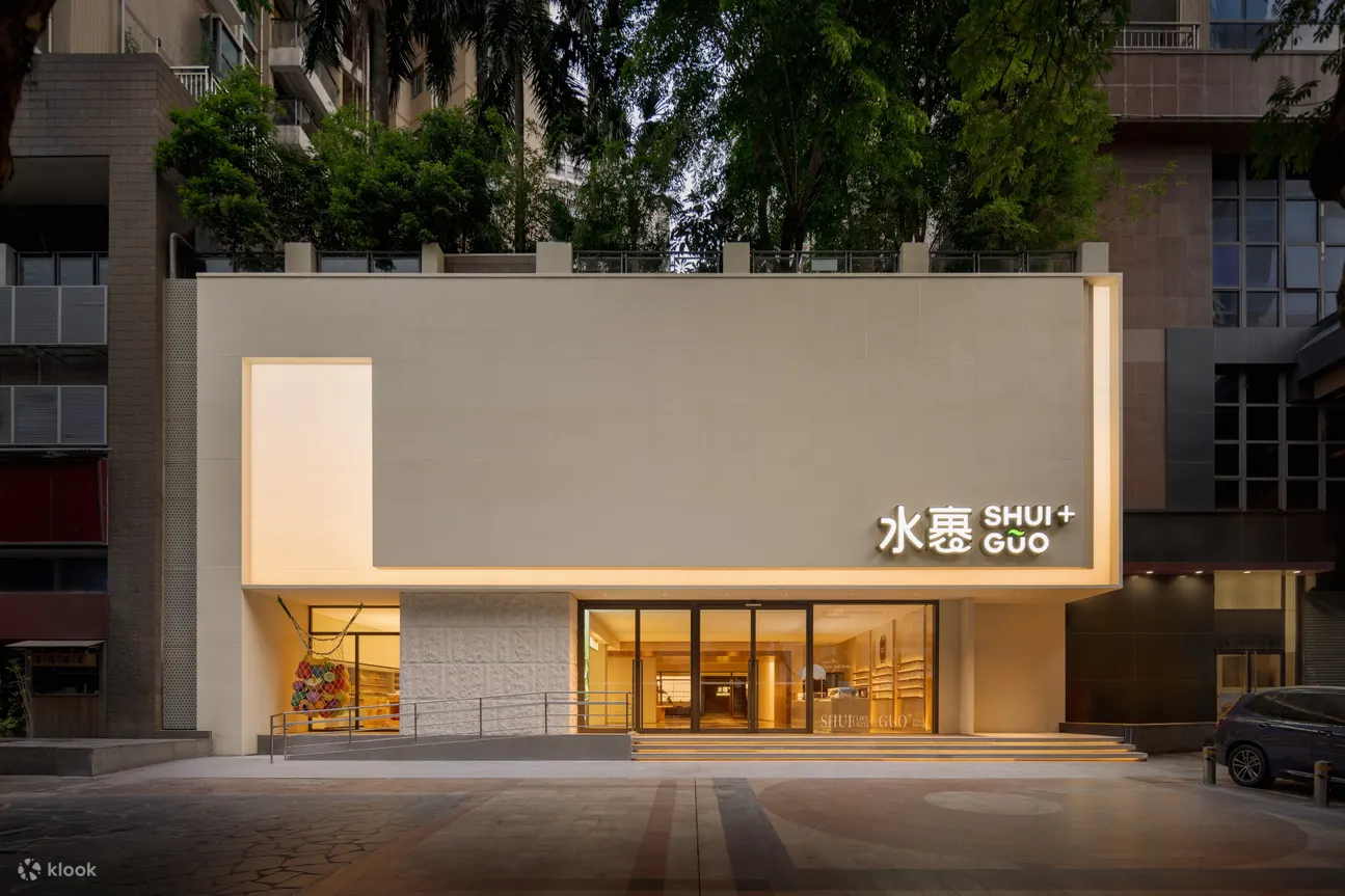 Shui Guo+ Shenzhen flagship entrance with the illuminated venue sign